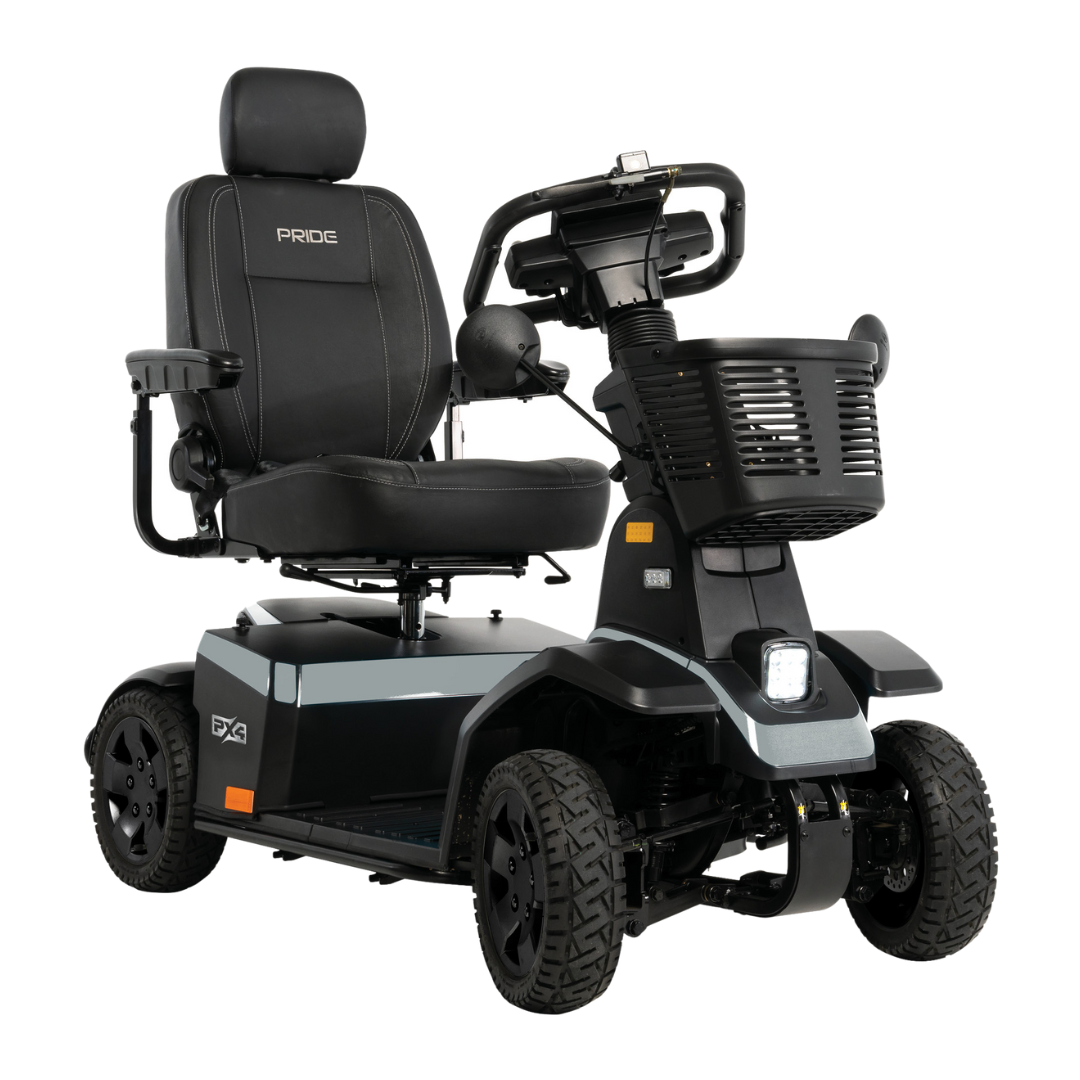 The Pride Mobility PX4 HD Bariatric Scooter is black, with a cushioned seat, headrest, armrests, handlebar controls, front basket, four large wheels, Pride branding on the seat backrest, and supports up to 500 lbs.